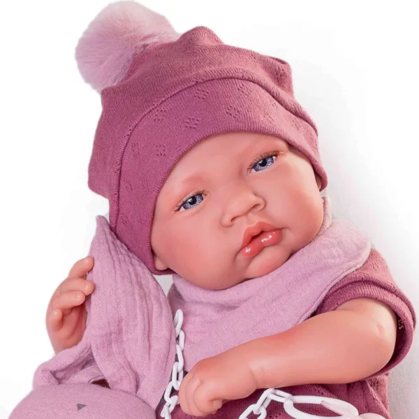 Кукла новородено Миа с розова шапка и помпон гледаща с изразителни сини очи