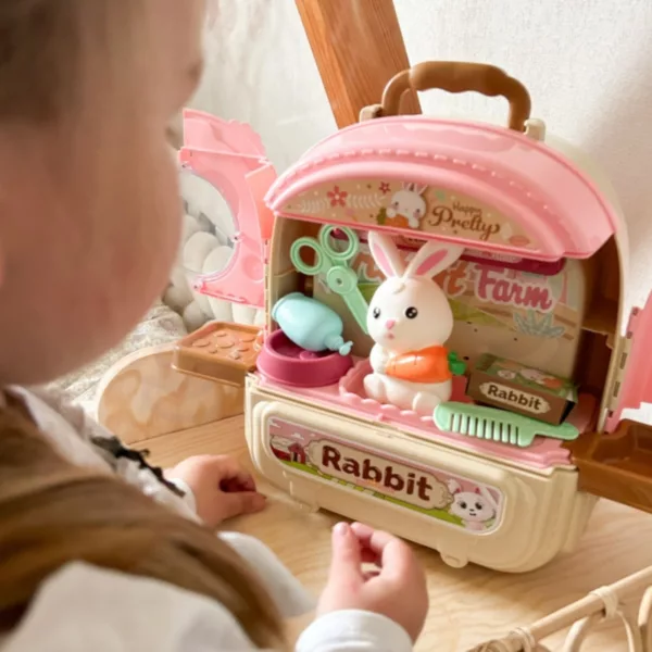Дете играе с детски ветеринарен комплект и къщичка за животни Jolly