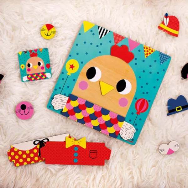 Магнитна дървена игра Весели герои Janod в цветна детска среда с забавни елементи