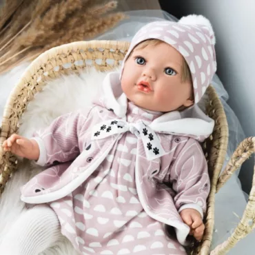 Бебе с меко тяло испанска кукла за гушкане в розов текстилен гащеризон