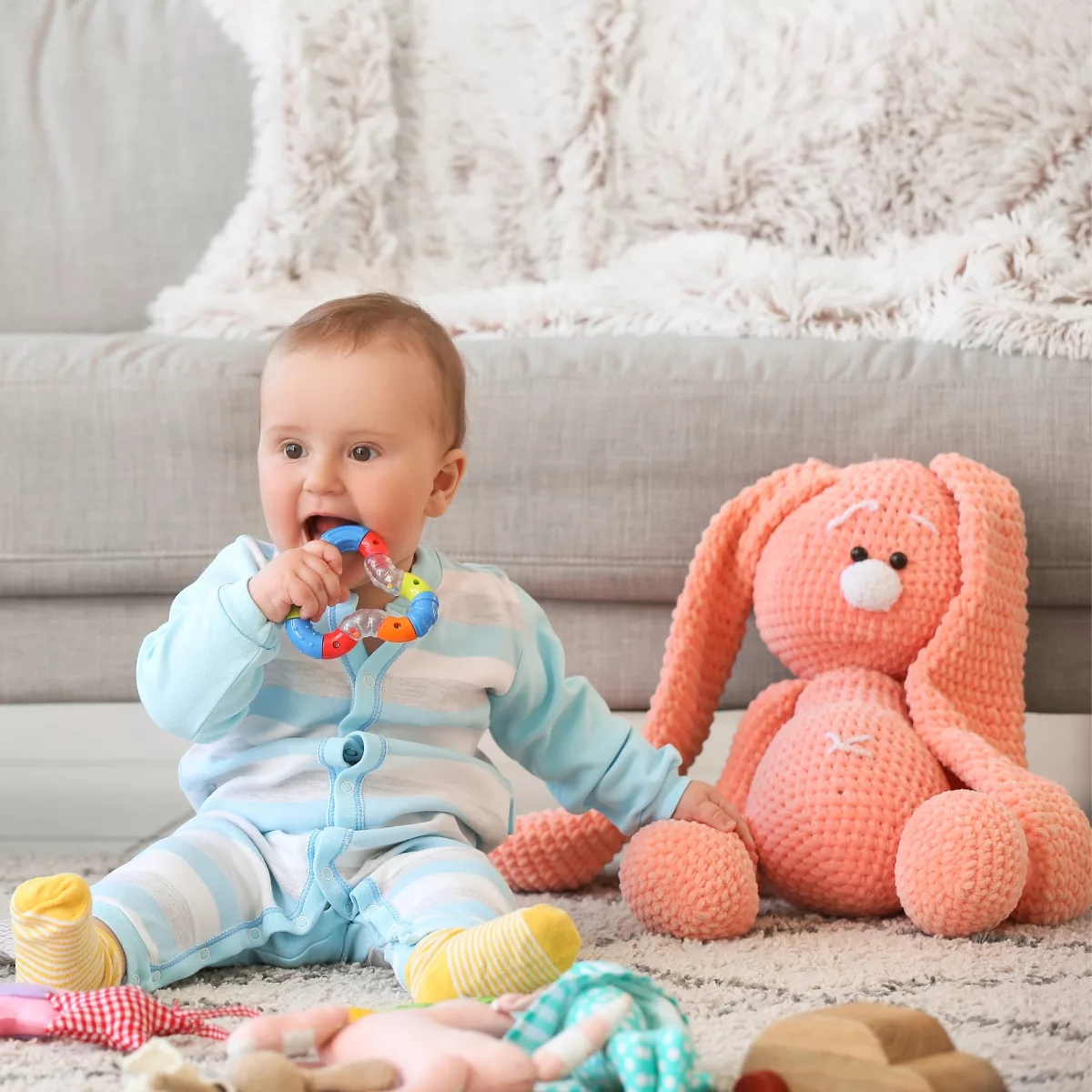 Бебешка гризалка с цветни рингове за никнещи зъбки и фина моторика